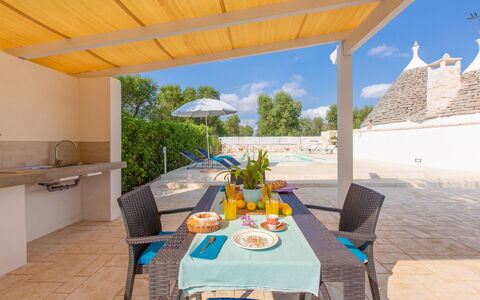 Trullo Del Mandarino: Property, Building, Room, Real Estate, House, Patio, Furniture, Villa, Interior Design, Table