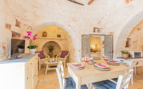 Trullo Del Mandarino: Property, Room, Building, Interior Design, Table, Furniture, House, Real Estate, Architecture, Dining Room