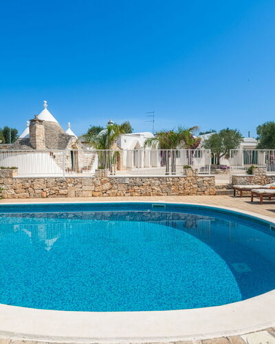 Borgo Marianna: Water, Sky, Plant, Property, Swimming Pool, Blue, Azure, Tree, Architecture, Building