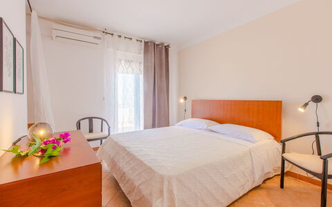 Villa Mezzaluna: Bedroom, Bed, Room, Furniture, Property, Bed Sheet, Bed Frame, Interior Design, Floor, Bedding