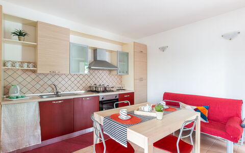 Prato Inglese Sinistro: Table, Property, Cabinetry, Furniture, Sink, Tap, Couch, Wood, Countertop, Interior Design