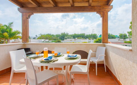Prato Inglese Sinistro: Sky, Table, Furniture, Cloud, Chair, Water, Wood, Porch, Interior Design, Tree
