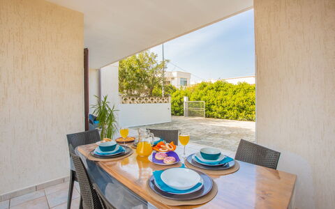 Villa Salento: Table, Plant, Tableware, Dishware, Azure, Wood, Building, Interior Design, Chair, Plate