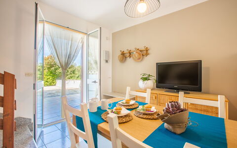 Villa Salento: Table, Property, Furniture, Wood, Lighting, Interior Design, Yellow, Floor, Living Room, Flooring