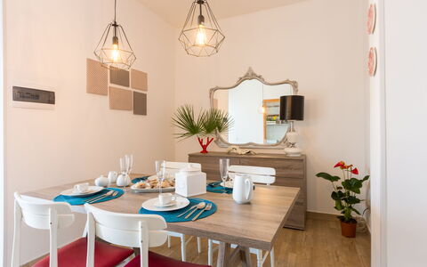 Villa Stelladali: Room, Property, Furniture, Dining Room, Interior Design, Building, Table, Turquoise, Wall, House