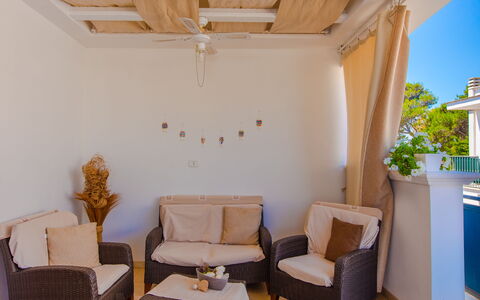 Appartamento Pineta Mare: Furniture, Property, Chair, Table, Wood, Lighting, Interior Design, Architecture, Floor, Flooring
