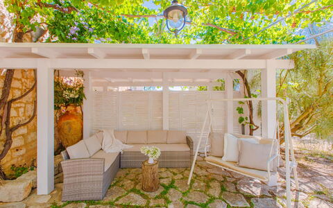 Masseria Pagliamonte: Plant, Building, Couch, Outdoor Furniture, Vegetation, Shade, Wood, Wall, Rectangle, Tree