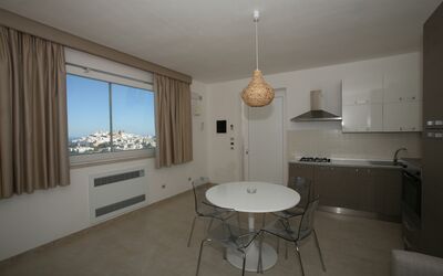 Villa Venere: Property, Building, Furniture, Window, Table, Wood, Interior Design, Shade, Curtain, Living Room