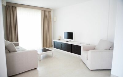 Villa Artemide: Property, Couch, Furniture, Comfort, Building, Curtain, Wood, Interior Design, Living Room