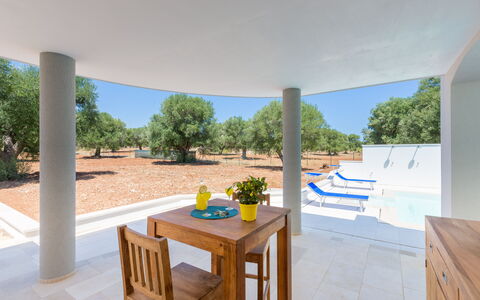 Villa Stella Cadente: Table, Plant, Furniture, Sky, Azure, Chair, Building, Interior Design, Wood, Tree