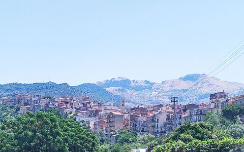 Sinago: Daytime, Mountainous Landforms, Hill, Residential Area, Mountain, Neighbourhood, Town, Landscape, Human Settlement, Mountain Range