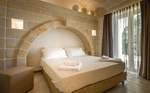 Corte dei Messapi | Sleeps 24: Bedroom, Bed, Furniture, Room, Property, Wall, Interior Design, Bed Frame, Bed Sheet, Suite