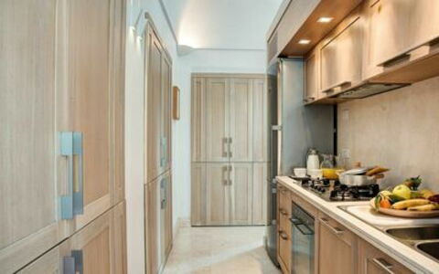 Villa Marina Little Beach: Building, Cabinetry, Property, Countertop, Food, Wood, Kitchen Appliance, Interior Design, Kitchen Stove, Door