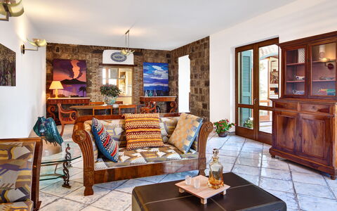 Stony Villa Volcano View: Picture Frame, Furniture, Property, Table, Couch, Azure, Interior Design, Lighting, Wood, Living Room