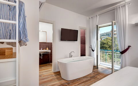Sorrento Golden Apartment: Property, Bathtub, Plumbing Fixture, Building, Azure, Wood, Tap, Window, Bathroom