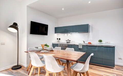 Luxury Blues Apartment: Cabinetry, Property, Furniture, Countertop, Wood, Table, Kitchen, Interior Design, Lighting, Chair