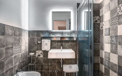 Loft In Sorrento: Mirror, Tap, Plumbing Fixture, Sink, Building, Bathroom Sink, Bathroom, Purple, Wood, Floor