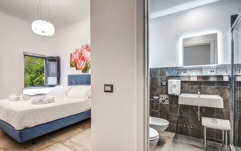 Loft In Sorrento: Furniture, Property, Building, Mirror, Comfort, Interior Design, Picture Frame, Television, Floor, Bed Frame