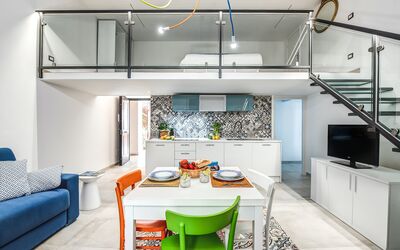 Loft In Sorrento: Table, Furniture, Property, Cabinetry, Couch, Blue, Building, Interior Design, Lighting, Countertop