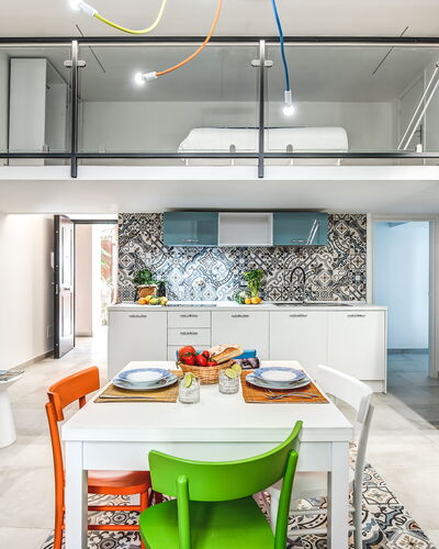 Loft In Sorrento: Table, Furniture, Property, Cabinetry, Couch, Blue, Building, Interior Design, Lighting, Countertop