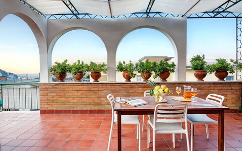 Parsano Home: Sky, Table, Furniture, Property, Plant, Azure, Shade, Architecture, Chair, Outdoor Furniture