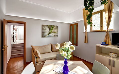 49 Little House: Flower, Property, Furniture, Plant, Comfort, Interior Design, Lighting, Living Room, Decoration, Picture Frame