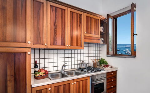 La Baia Dello Chalet: Cabinetry, Countertop, Property, Furniture, Tap, Kitchen Appliance, Wood, Kitchen Stove, Kitchen, Window