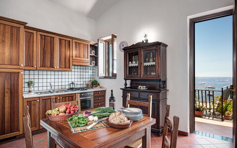 La Baia Dello Chalet: Table, Furniture, Property, Cabinetry, Plant, Wood, Chair, Interior Design, Picture Frame, Living Room