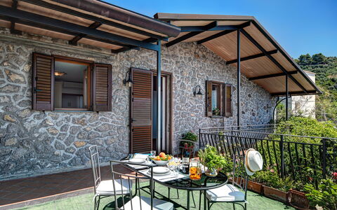 La Baia Dello Chalet: Plant, Building, Table, Furniture, Property, Window, Sky, Chair, Flowerpot, Interior Design