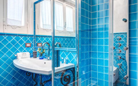 Medusa And The Seahorse Villa: Mirror, Tap, Sink, Plumbing Fixture, Blue, Window, Purple, Azure, Bathroom Sink, Bathroom
