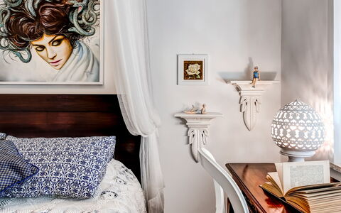 Medusa And The Seahorse Villa: Furniture, Picture Frame, Comfort, Textile, Interior Design, Wood, Lamp, Pillow, Living Room