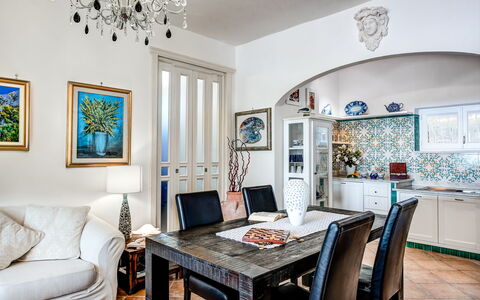 Medusa And The Seahorse Villa: Picture Frame, Table, Property, Furniture, Blue, Azure, Couch, Chair, Lighting, Interior Design