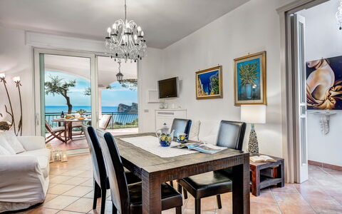 Medusa And The Seahorse Villa: Table, Picture Frame, Furniture, Property, Azure, Chair, Interior Design, Wood, Desk, Floor