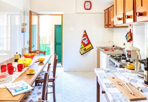 Luigina - Levanto: Room, Lighting, Interior Design, Yellow, Table, Interior Design, Ceiling, Light Fixture, Orange, Kitchen
