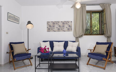 Villa Marlene: Furniture, Building, Property, Window, Picture Frame, Couch, Comfort, Azure, Wood, Interior Design