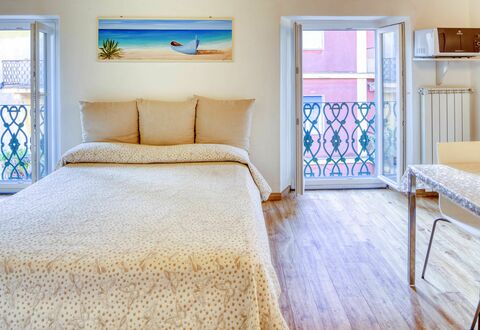 Studio Fede - Levanto: Furniture, Blue, Building, Comfort, Window, Azure, Wood, Textile, Bed Frame, Flooring