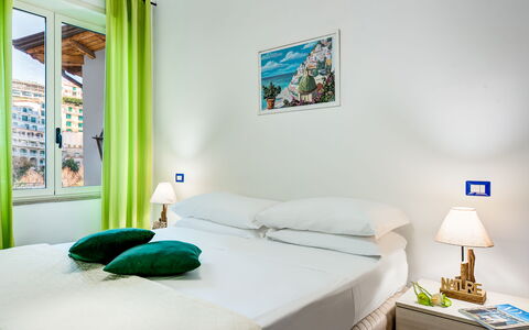 Living Times Apartment: Furniture, Property, Green, Comfort, Blue, Azure, Textile, Lighting, Pillow, Interior Design