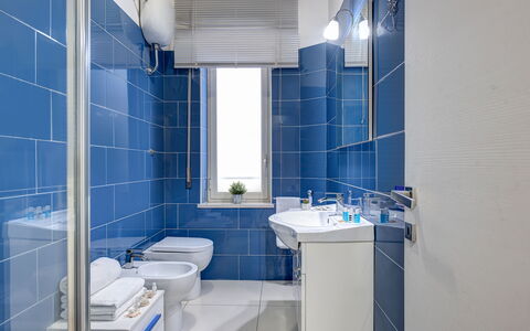 Loving Times Apartment: Plumbing Fixture, Tap, Mirror, Sink, Property, Purple, Blue, Bathroom, Azure