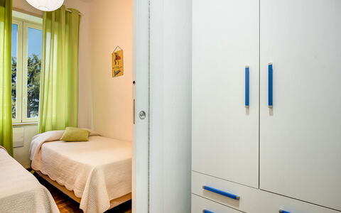 Loving Times Apartment: Window, Cabinetry, Wood, Comfort, Building, Flooring, Curtain, Bed Frame, Floor