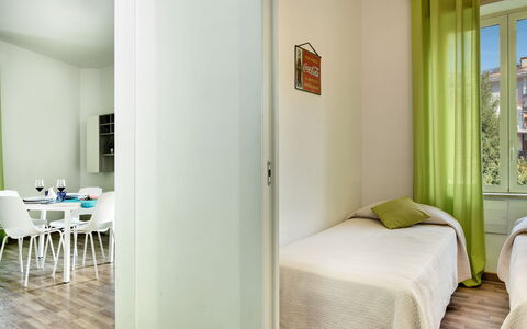 Loving Times Apartment: Furniture, Green, Comfort, Wood, Table, Interior Design, Building, Flooring, Floor
