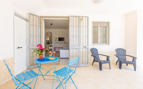 Case Pantanagianni: Furniture, Table, Property, Chair, Cabinetry, Wood, Interior Design, Lighting, Window, Houseplant
