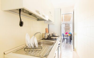 Casa Turchese: Building, Countertop, Interior Design, House, Wood, Floor, Flooring, Wall, Hall, Kitchen