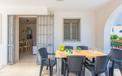 App. Smeraldo: Table, Furniture, Property, Chair, Wood, Building, Interior Design, Living Room, Window, Floor