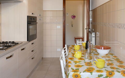 Angelo: Property, Cabinetry, Furniture, Building, Door, Dishware, Drinkware, Countertop, Stemware, Floor