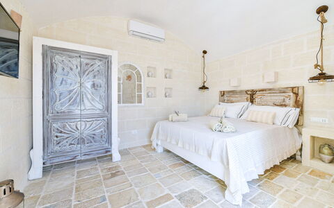 Villa Ofelia: Building, Furniture, Picture Frame, Window, Cabinetry, Comfort, Wood, House, Bed Frame, Lighting
