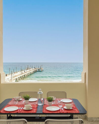 Terrazza sul Molo: Sky, Cloud, Food, Plant, Tableware, Table, Window, Mountain, Fruit, Wood
