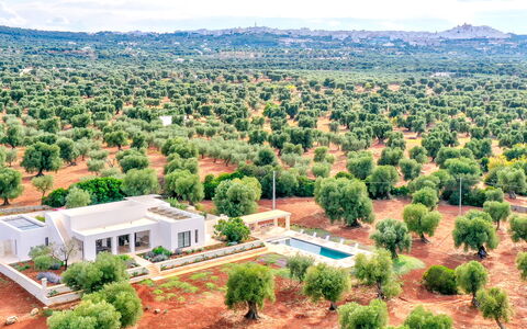 Villa Orama Estia Relais: Plant, Sky, Property, Cloud, Tree, Natural Landscape, Land Lot, Architecture, Vegetation, Urban Design