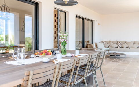 Villa Orama Estia Relais: Table, Furniture, Couch, Picture Frame, Window, Food, Azure, Wood, Tableware, Lighting