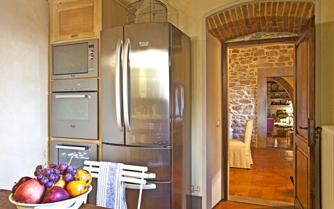 Villa Adelfa: Furniture, Food, Tableware, Building, Cabinetry, Table, Door, Wood, Lighting, Interior Design