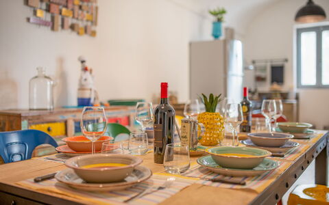 Masseria Tufo Bianco: Table, Food, Tableware, Property, Bottle, Furniture, Drinkware, Dishware, Kitchen, Orange